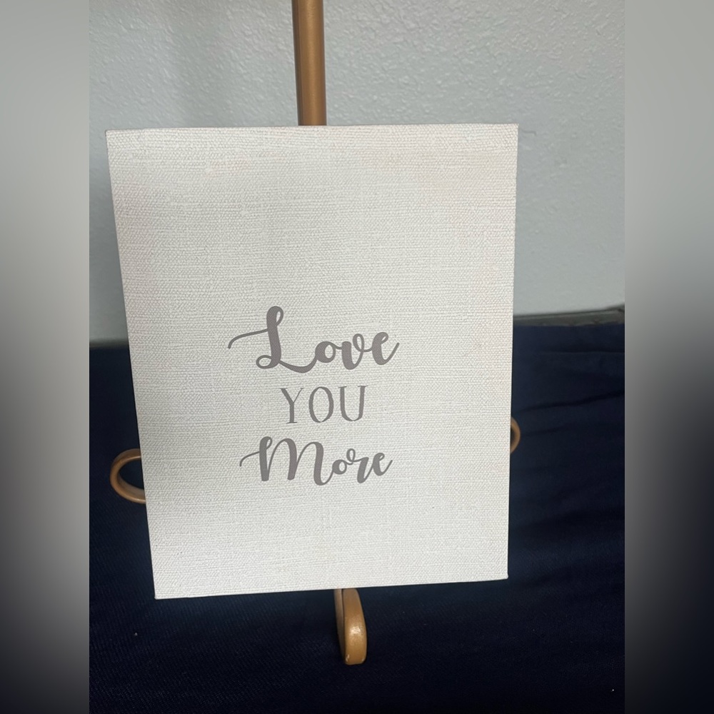 “Love you more” canvas picture.